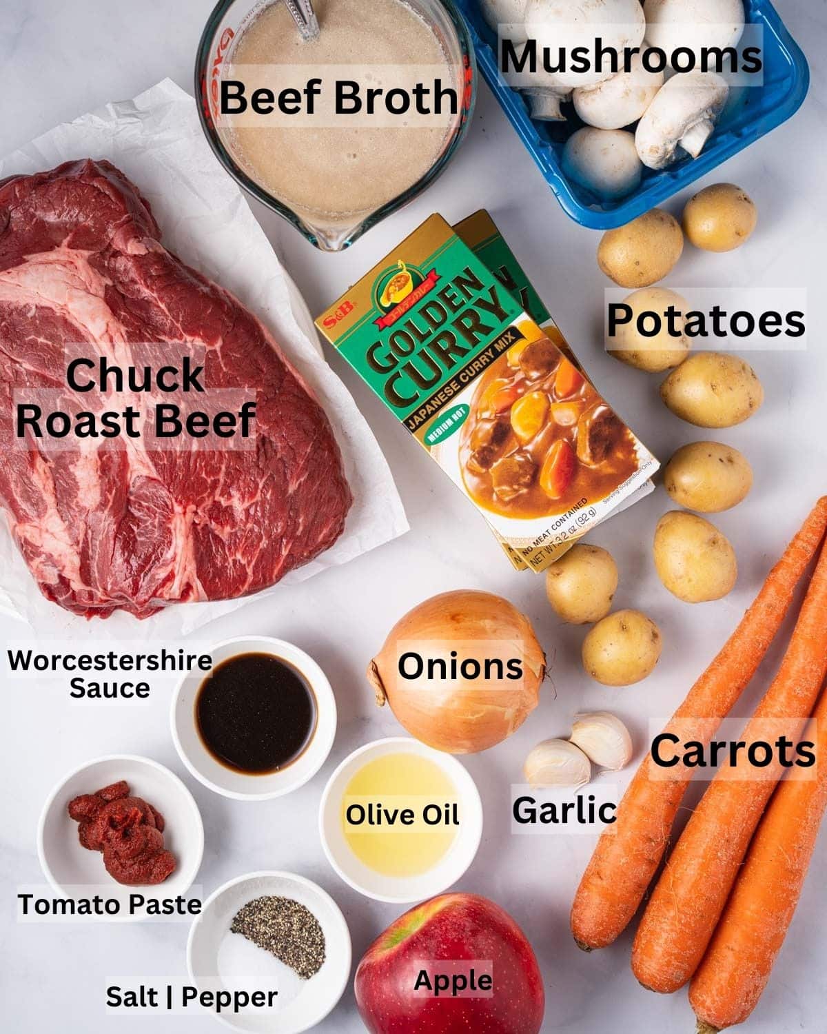 Ingredients needed for Instant Pot Japanese Curry: Chuck roast beef, beef broth, mushrooms, potatoes, carrots, onions, garlic, apple, Japanese curry roux, olive oil, Worcestershire sauce, tomato sauce, salt and pepper.