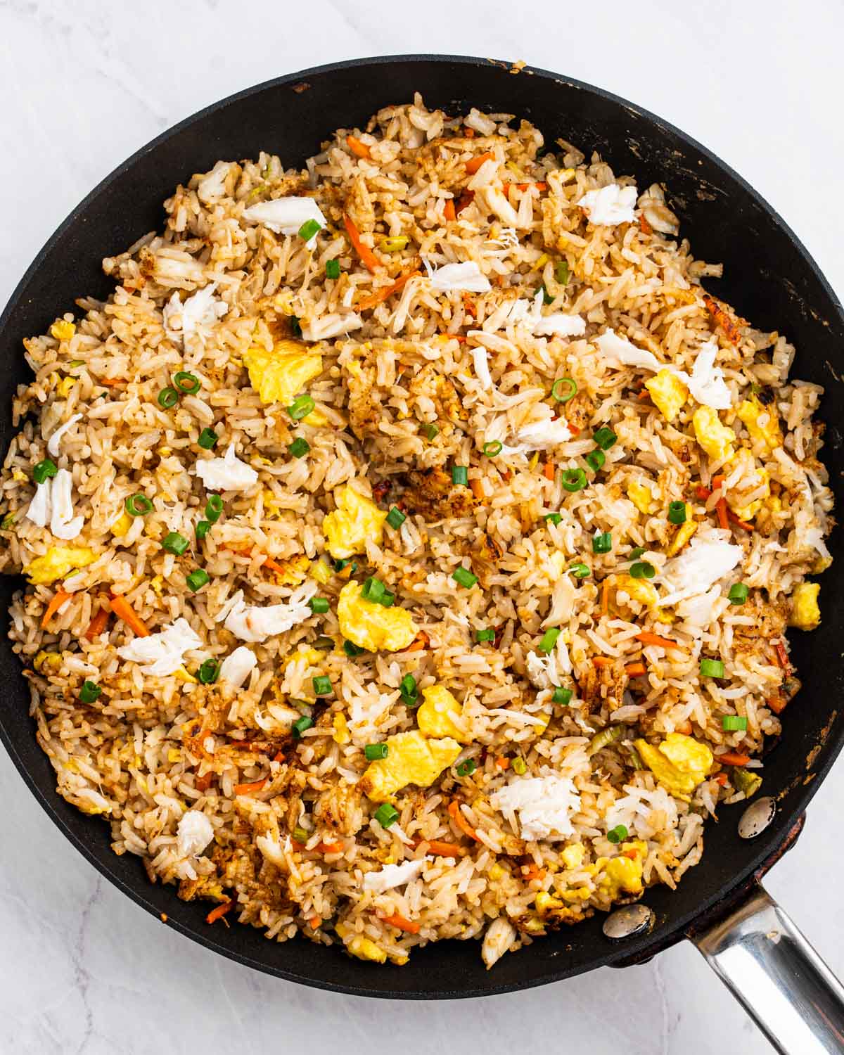 Pan of crab fried rice.