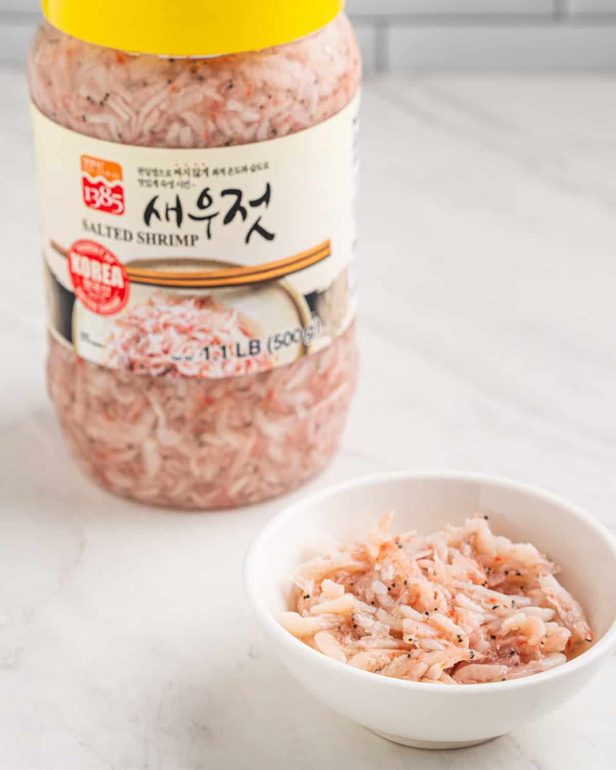 salted fermented shrimp (saeujeot) in jar and bowl.
